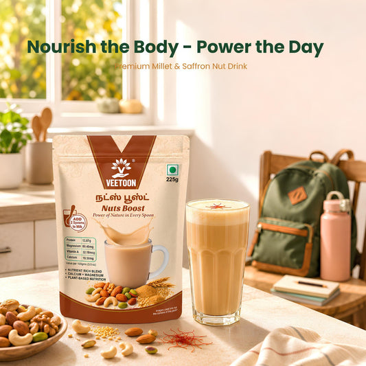 Nuts Boost millet and saffron nut drink mix 225g pack with a glass of creamy saffron nut milk